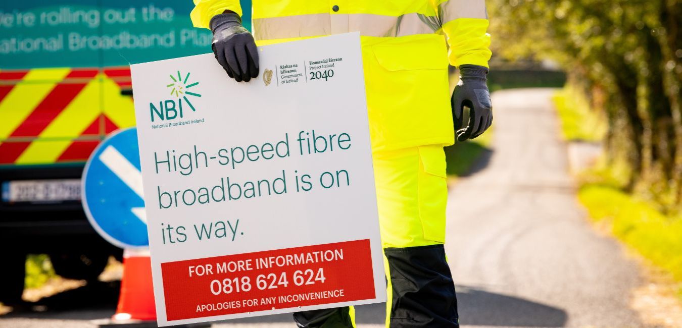 National Broadband Ireland (NBI), the company delivering the new future-proofed, high-speed Fibre-to-the-Home network under the National Broadband Plan on behalf of the Government, has said that almost 1,500 Mayo properties in its Carrowmorelacken deployment area can now avail of a high-speed fibre broadband connection. This includes the rural areas and townlands surrounding Killala, Ballycastle and Rathlacken. 37,000 premises in Co Mayo are included in the State’s Intervention Area, which will see NBI deliver minimum speeds of 500 megabits per second to homes, businesses, farms, and schools. As the biggest investment in rural Ireland since rural electrification, Co Mayo will receive €145M of Government investment under the National Broadband Plan. There are 1,547 Mayo premises in the Carrowmorelacken deployment area that can join the NBI™ network. National Broadband Ireland is calling on people living nearby to visit nbi.ie/map/ and enter their Eircode to see if they are ready to connect. There are 10,481 homes, businesses, and farms in County Mayo that can order or pre-order high-speed, reliable broadband with 2,812 connections made to the NBI™ network so far. Network build works are also continuing across Mayo with works in progress for over 1,500 premises on Achill Island, which are due to be connected between January and March 2025. Signing up to the NBI email notifications at /eoi/ is the easiest way to get the most up-to-date status of premises during the rollout and when premises will be ready for order. Peter Hendrick, Chief Executive Officer, National Broadband Ireland, said: “We are delighted to announce that over 1,500 Mayo premises near Killala can now order high-speed broadband services through the NBI™ network. This will enable those who connect to experience the life-changing benefits of high-speed broadband with minimum speeds of 500 megabits per second. “Almost 10,500 homes, businesses and farms in Co Mayo can now order a high-speed fibre connection to the NBI™ network. This includes over 2,150 premises near Ballina, over 2,00 near Castlebar, almost 1,800 near Newport, over 2,000 near Liscarney and over 1,000 premises in the Killadoon deployment area. We are working hard on the ground to progress other areas of the county through engineering survey, design and construction phases. We encourage local residents to visit the NBI website to check their Eircode and sign up for updates.” As a wholesale network operator, NBI does not sell fibre broadband directly to end users, rather it enables services from a range of broadband providers or Retail Service Providers (RSPs). As a wholesale provider, NBI will make the new Fibre-to-the-Home network available to all RSPs operating in the Intervention Area.   Some 72 RSPs have already signed up to sell services on the NBI™ network and 68 are certified as ready to start providing connections as of today. To see the retail broadband providers that are currently licensed to sell on the NBI™ network, visit NBI.ie/buy. National Broadband Ireland contractors have been on the ground across the country and over 297,401 premises nationwide can order or pre-order broadband on the NBI™ network so far. The National Broadband Ireland website is regularly updated to show estimated connection dates. Signing up to the NBI email notifications at /eoi/ is the easiest way to get the most up to date status of premises during the rollout and when premises will be ready for order. Keep up to Speed!  NBI is encouraging people to check their eligibility and register for updates at www.nbi.ie to receive regular notifications related to their own premises as works progresses in their area.  Broadband Connection Points In advance of the Fibre-to-the-Home rollout, the NBP provides for the delivery of Broadband Connection Points (BCPs) nationwide. 955 of these sites, including Public BCPs, are now ‘live’. Public BCPs – which include sports clubs, community centres and tourist sites – will provide free public access to high-speed internet in the rollout area. Other BCP categories include schools and marts. BCPs will pave the way for rural communities to receive the benefits of broadband, from mobile working, e-learning and mobile banking, to digital tourism. You can view BCPs at www.nbi.ie/bcp-map/. An example of some of the locations of Broadband Connection Points in Mayo include Bofeenaun Community Centre, Clogher Community Centre and Islandeady Community Centre. Primary schools in the Intervention Area are now connected for educational access as part of the NBP.